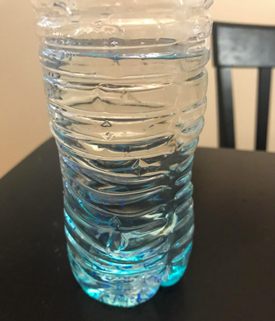 bottle right side up with water and soap inside