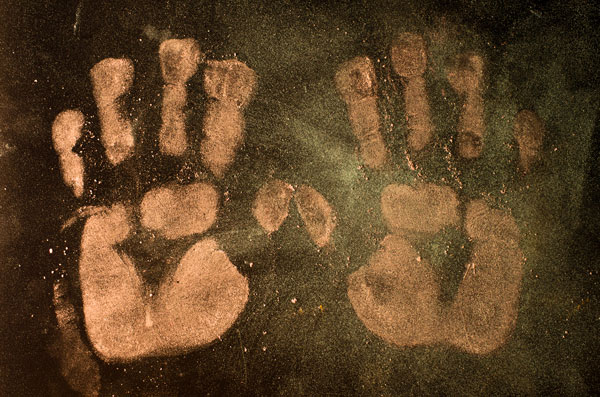 hand prints from very dirty hands. Shows how germs move from hands to surfaces.